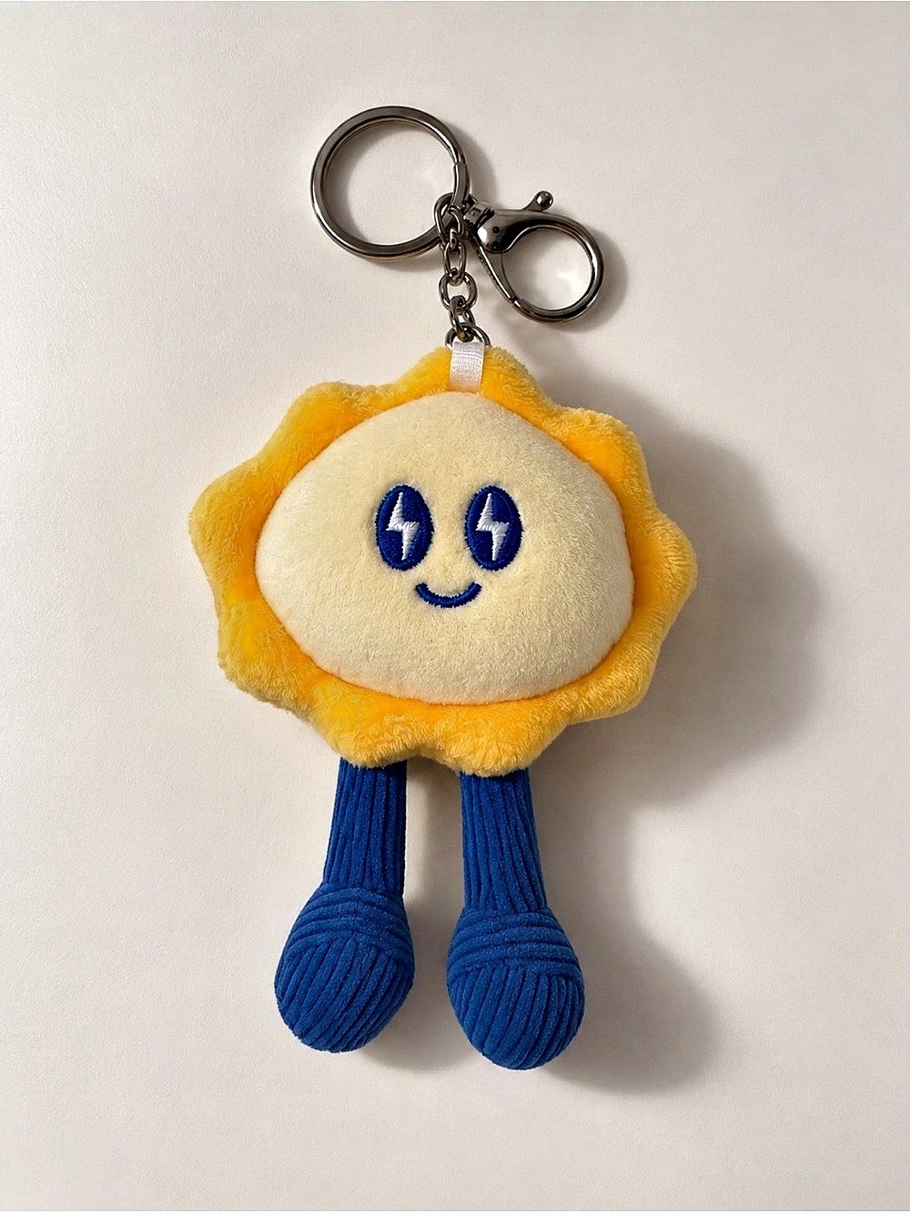 Dutch Bros Radiate Kindness Plush Keychain Yellow & Blue